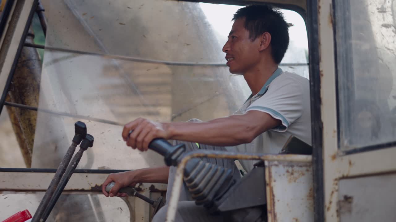 Construction worker operating an excavator