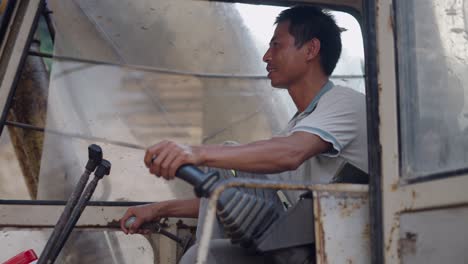 construction worker operating an excavator