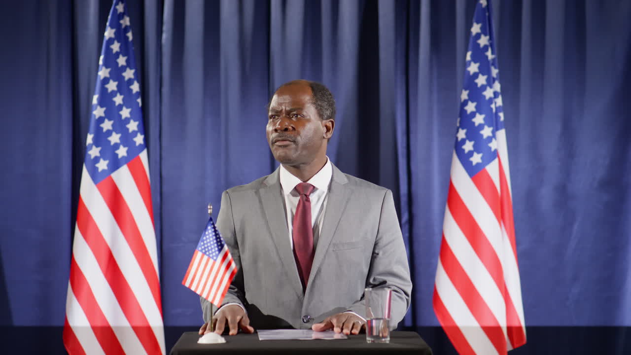 African American Politician Talking on Camera at Press Conference