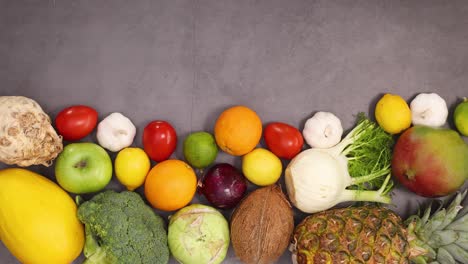 organic healthy fruits and vegetables move ordered on the bottom of kitchen table. stop motion