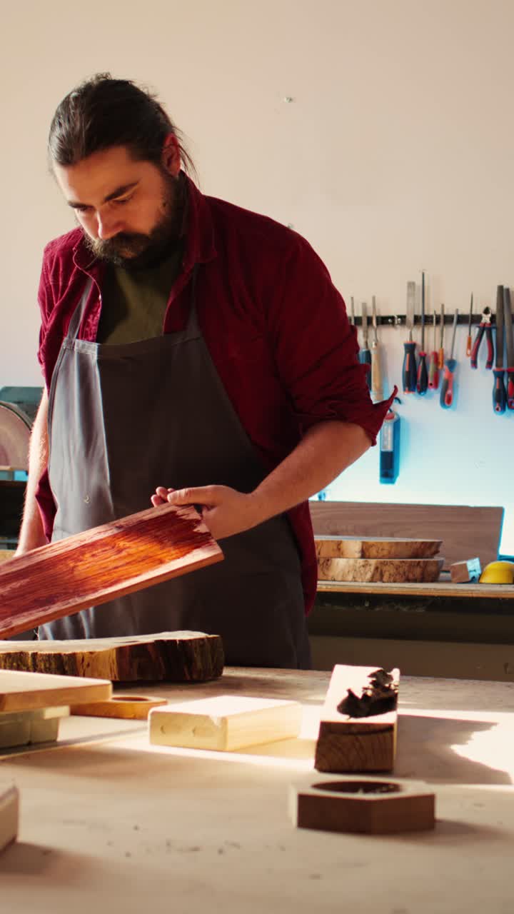 Craftsman Applying Protective Finish to Wooden Board