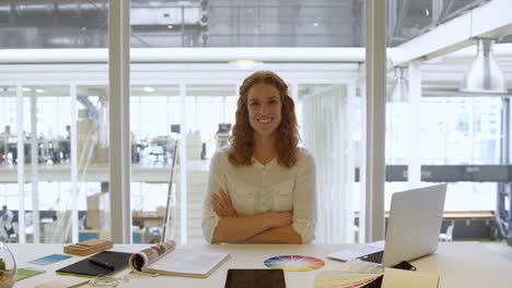 Businesswoman-sitting-with-arms-crossed-4k