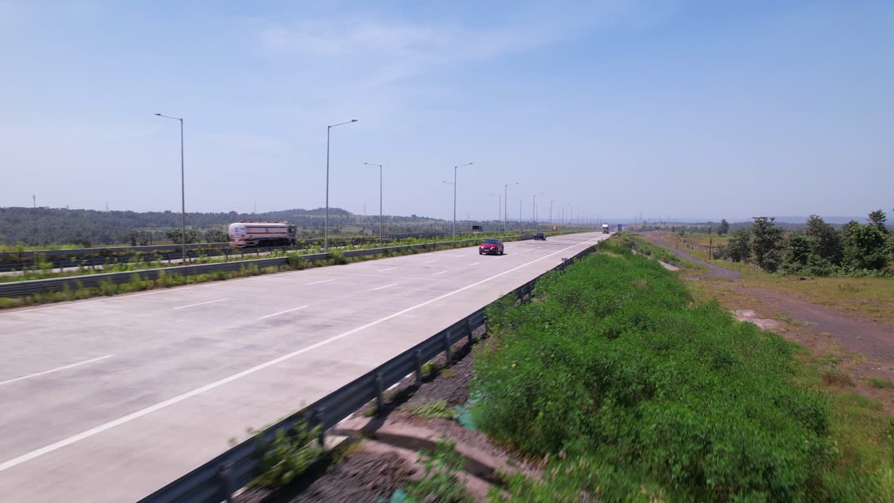 The car is speeding on Samruddhi Mahamarg, Mumbai Nagpur Expressway, Maharashtra, Drone