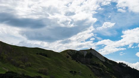 mesmerizing timelapse of a hillside near the ocean, captured from a unique perspective looking up, showcasing the ever-changing beauty of coastal landscapes