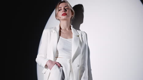 stylish woman in white suit