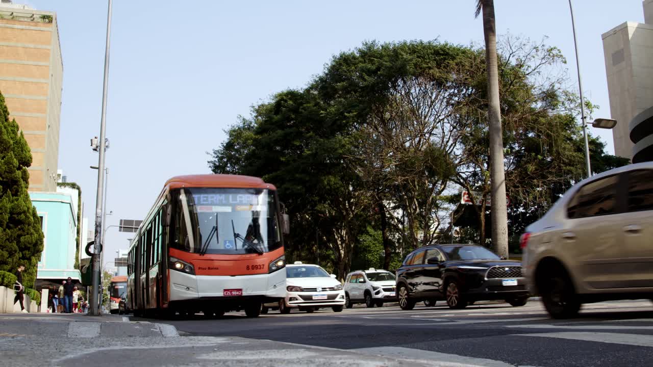 On the city bus, in its flow, endless miles, where urban all roads go