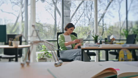 office manager enjoy break holding cup beverage desk. lady drinking cappuccino