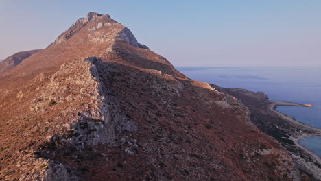 scenic view of rugged mountain landscape overlooking the tranquil sea