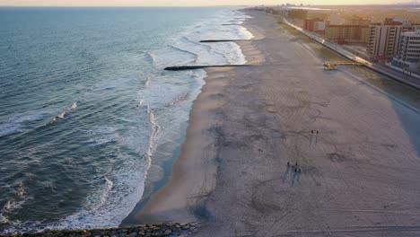 a high angle shot over an empty beach during sunset