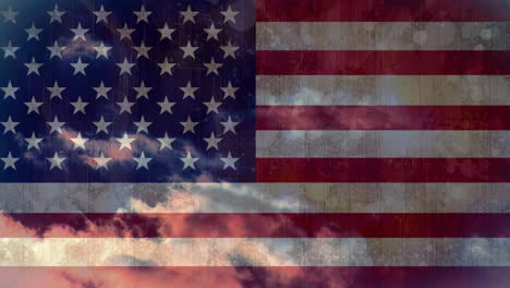 american flag with clouds
