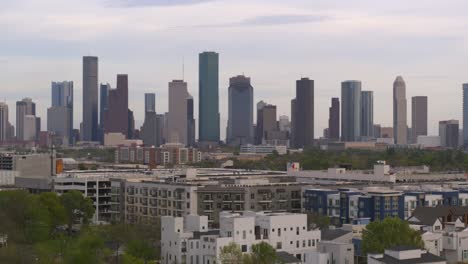 descending drone shot from downtown houston to the buffalo bayou