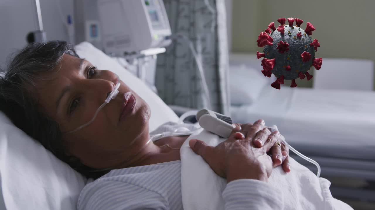célula de covid-19 contra una paciente femenina en una cama de hospital