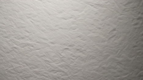 wrinkled white fabric or paper texture background