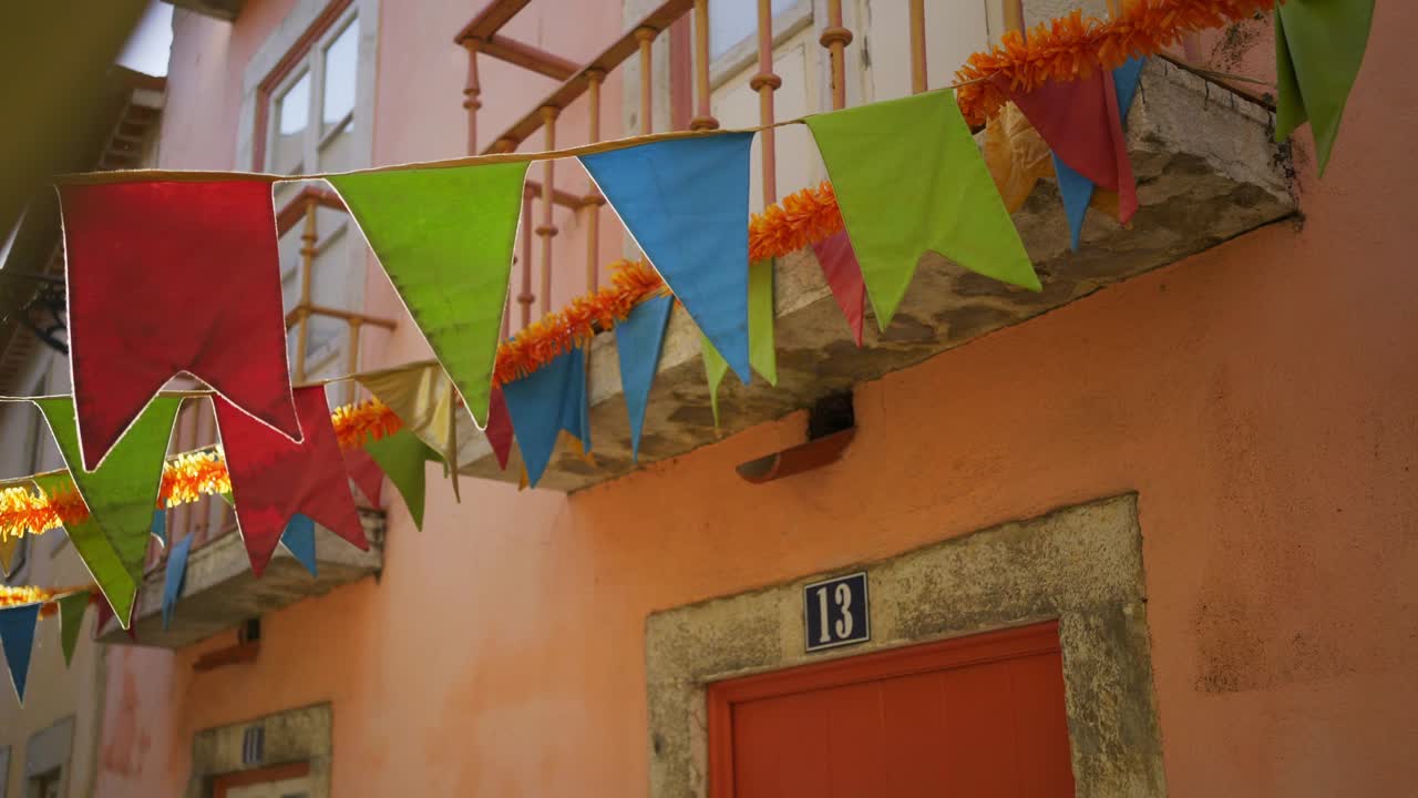 Colorful flags on city street