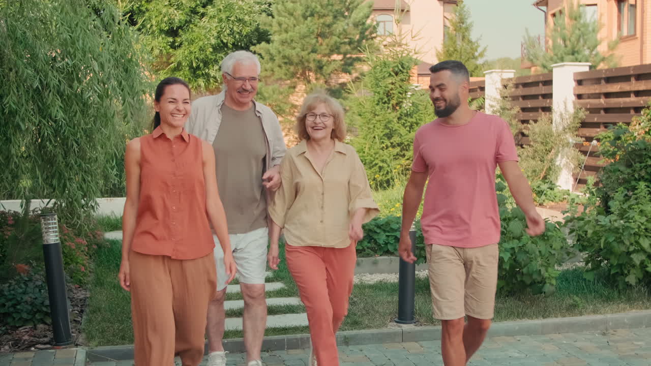 Big Family Of Six Walking Outdoors