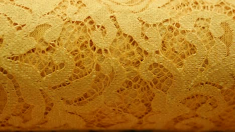 macro shot of a lace, fabric used to make elegant wedding dresses for the wedding day.