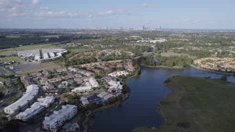 residential properties by the mudgeeraba creek in the town of robina in queensland, australia