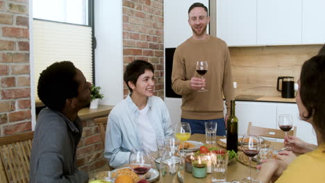 man talking to the people at home