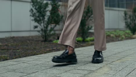 person walking on city street