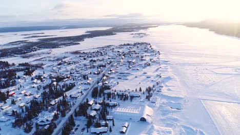 An-Aerial-View-Shows-The-Colorful-Homes-Near-A-Forest-In-The-Wintry-Town-Of-Kiruna-Sweden-1