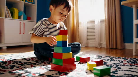 child playing with wooden blocks