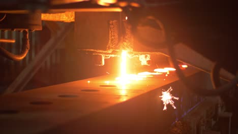 process pouring molten metal for parts formation at metallurgical plant