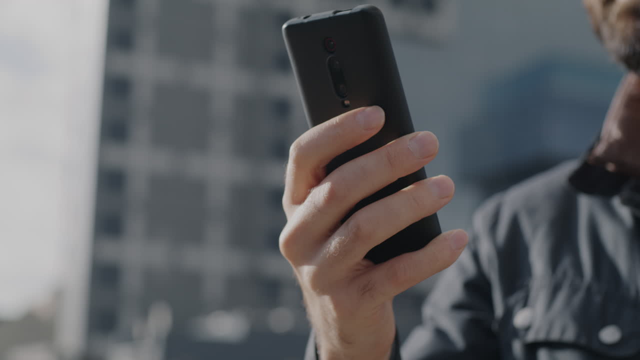 Person using a smartphone in the city