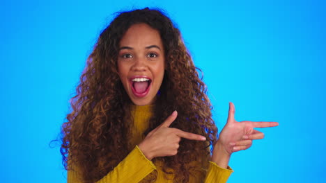 Woman,-gun-fingers-and-pointing-in-studio