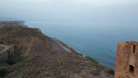 Experimente-La-Histórica-Torre-De-Jaral-En-Almayate-Bajo-Desde-Una-Fascinante-Vista-De-Dron