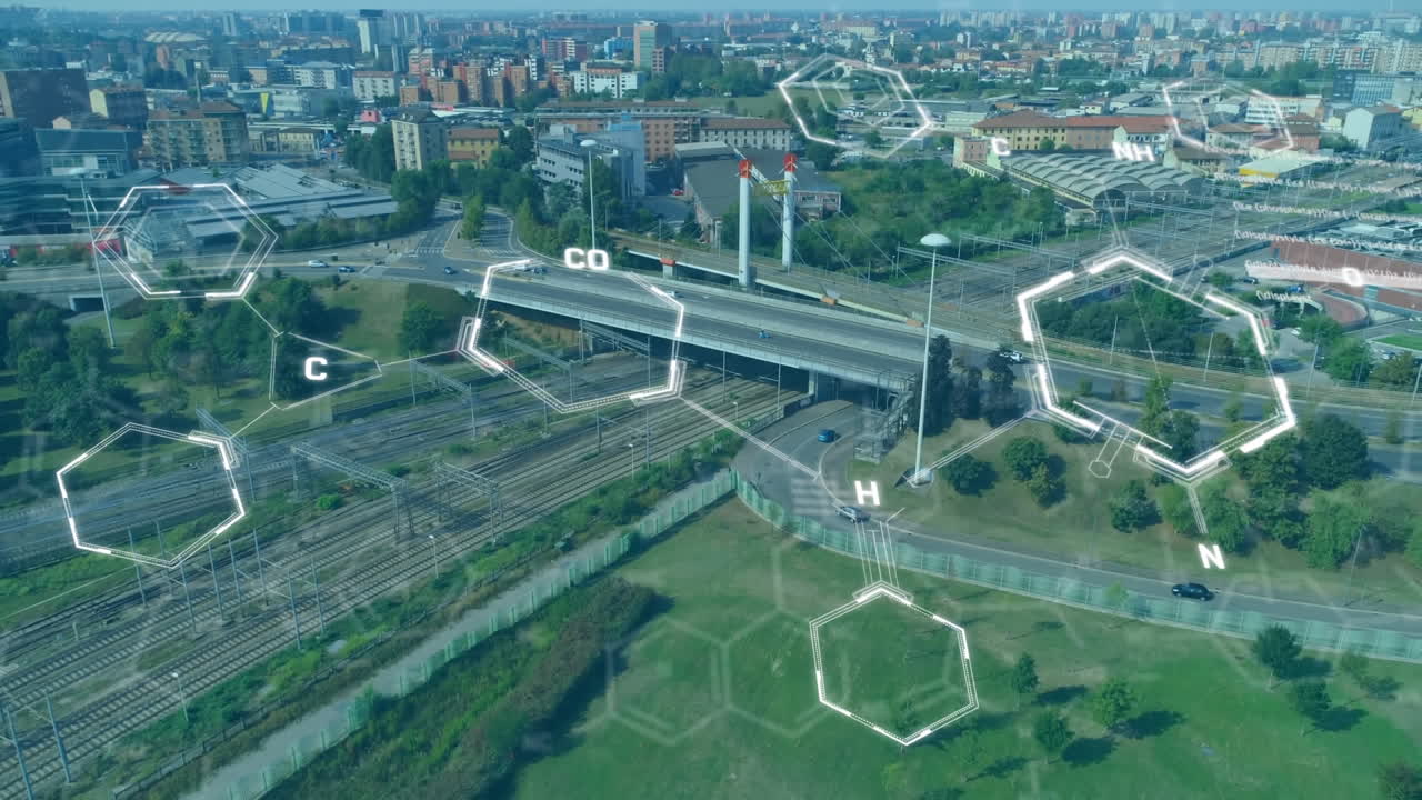 Animace chemických struktur a zpracování dat přes letecký pohled na panoráma města.