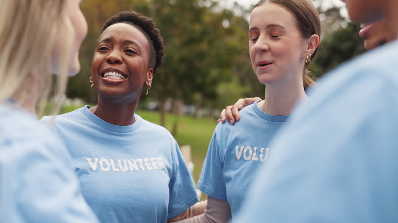 Group of Volunteers Smiling and Talking Together