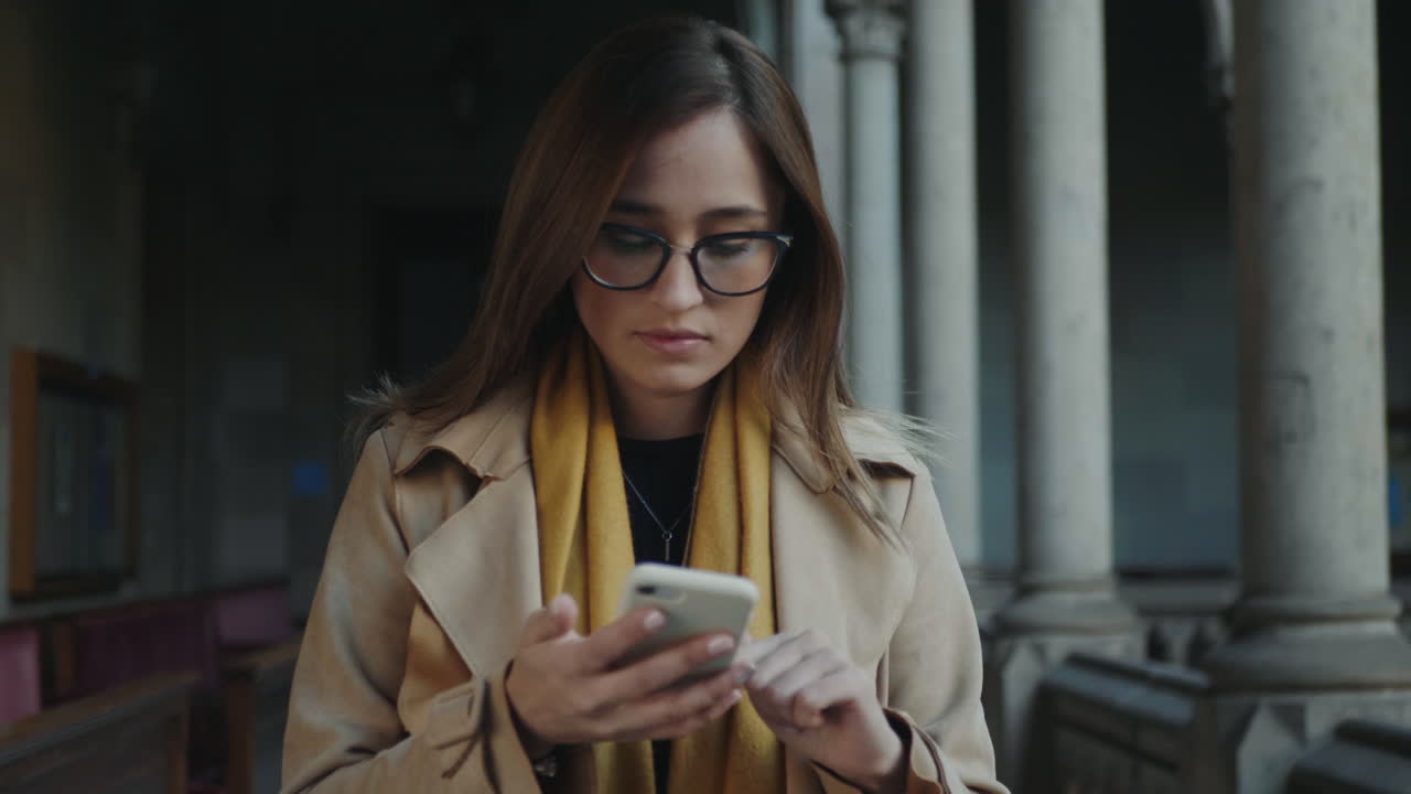 Student browsing internet on phone