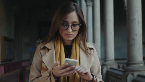 student browsing internet on phone