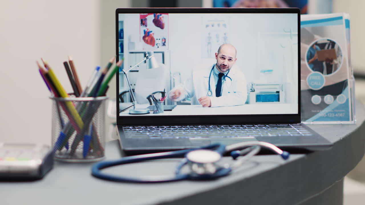 Male specialist on videocall in clinic