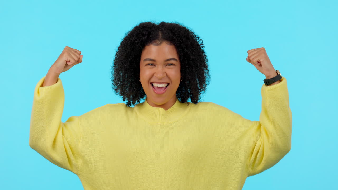 Champion, woman flexing biceps and winning