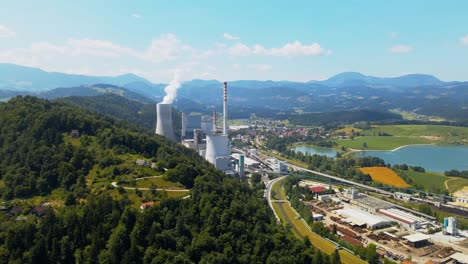 aerial drone 4k drone footage view of šaleška dolina, and thermal power plant in operation – šoštanj in slovenia