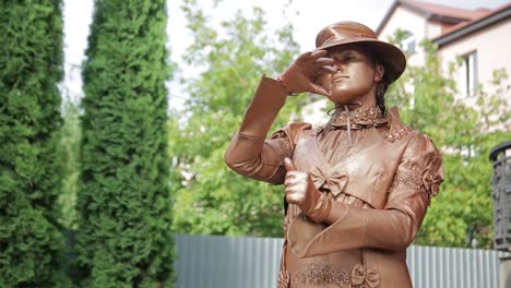 living bronze statue performing outdoors