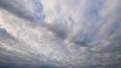 Timelapse-shot-of-clouds-passing-by-whilst-turning-into-night