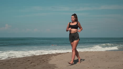 woman running on the beach