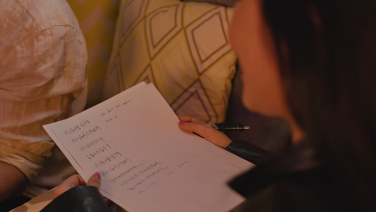 People looking at sheet music