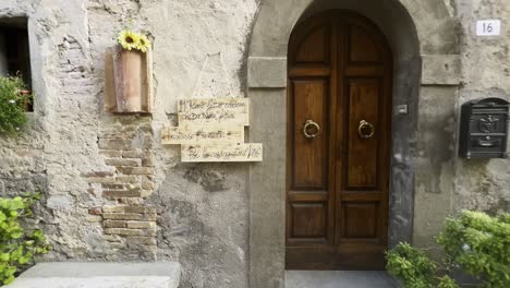 Grape-harvest-festival-of-medieval-Penna-in-Teverina-town-with-decorated-houses-and-streets,-Italy