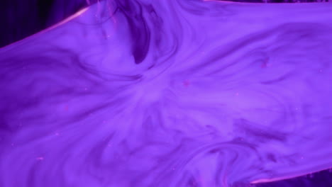 abstract purple fluid star shape expanding in fluid