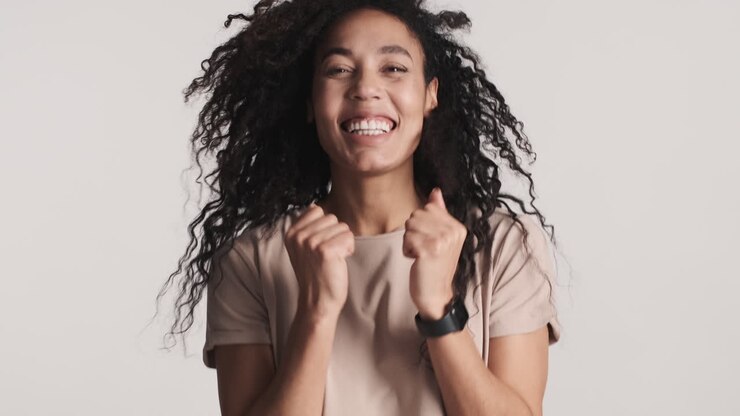 African american happy woman over white background.