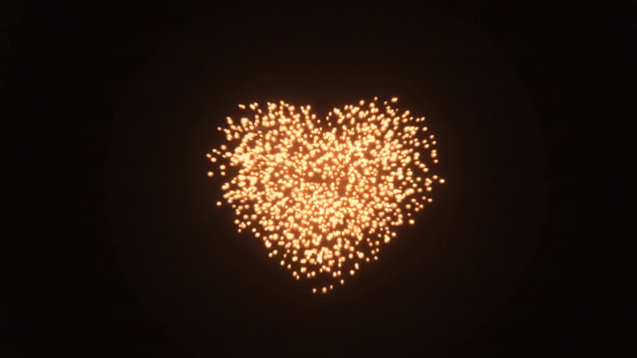 Scintille incandescenti a forma di cuore che inviano striature radiali e formano un bagliore centrale sul vuoto nero