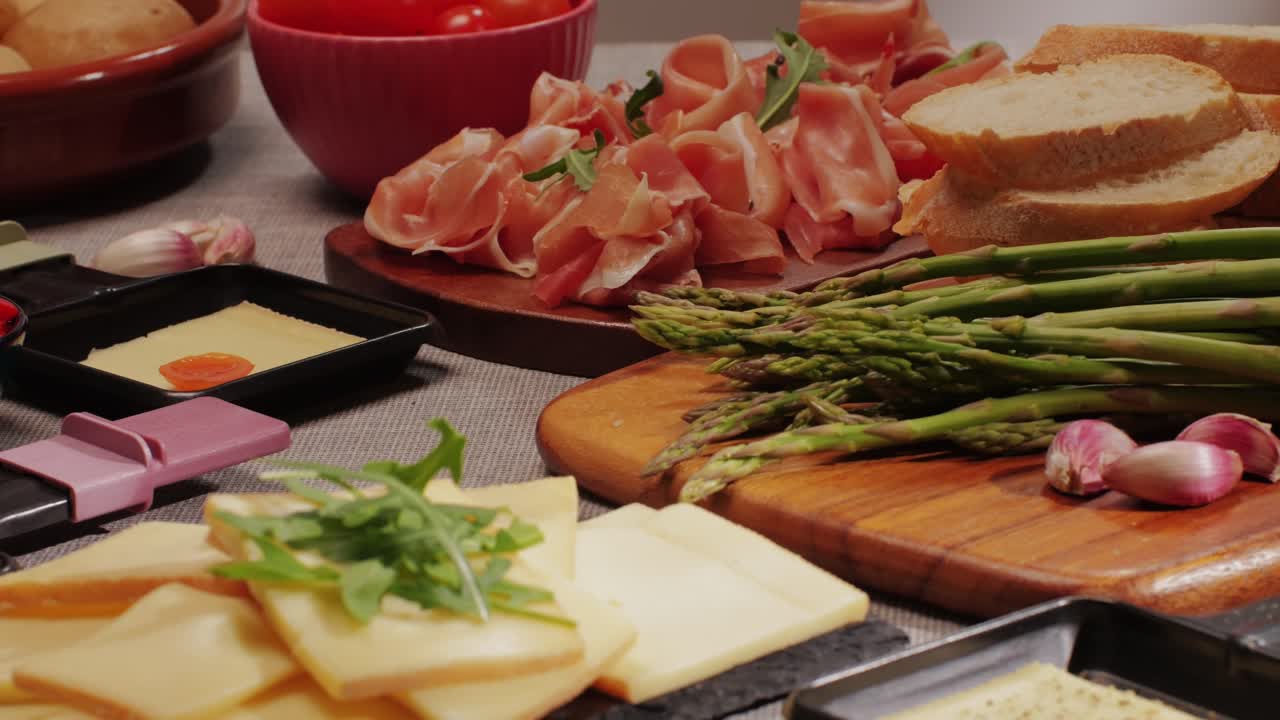 Italian or Spanish restaurant with traditional tapas food, Spanish cuisine, delicious tapas and cheese plate, bruschetta with cheese, olives dry tomatoes and tasty sandwich bar appetizer, buffet