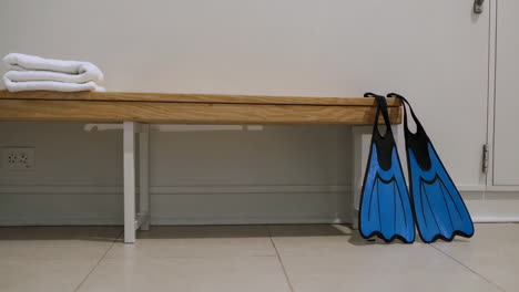 locker room with swimming equipment