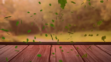 animación de hojas soplando sobre la mesa de madera y el césped y las plantas en el jardín