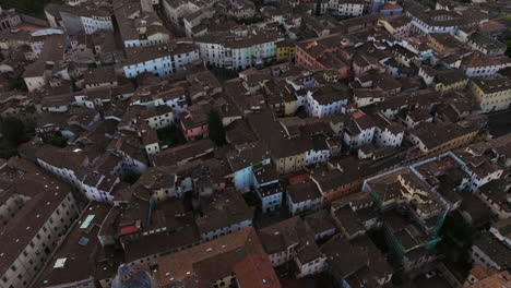 aerial view over historic city of spoleto in italy - drone shot