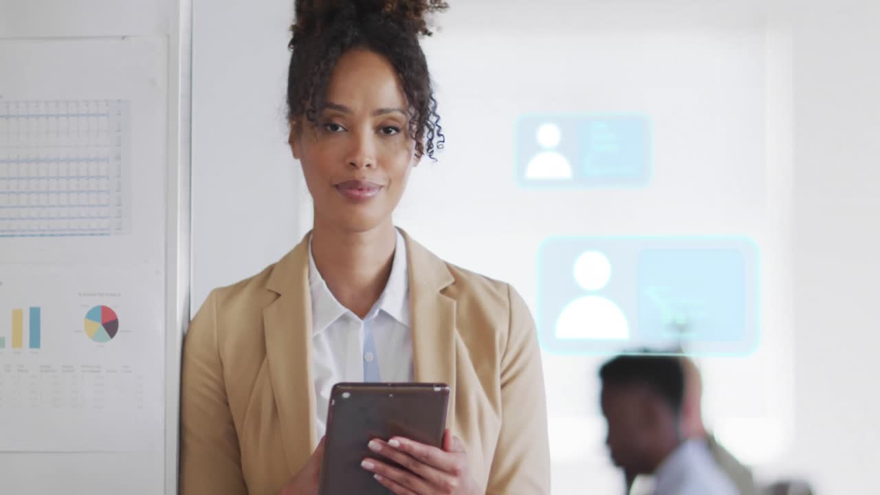 Animation of icons and data processing over biracial businesswoman in office