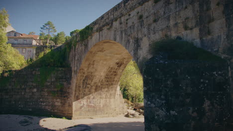 roman bridge in alcafache viseu portugal slow motion gimbal shot